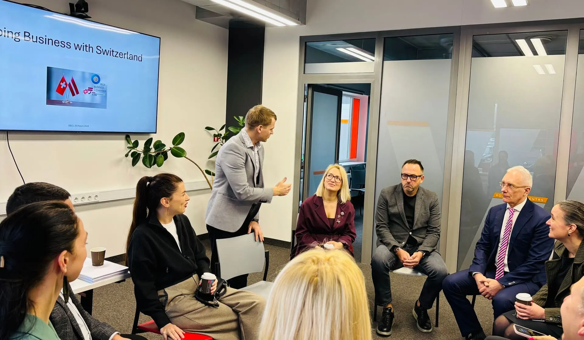 Business partners shaking hands in professional setting